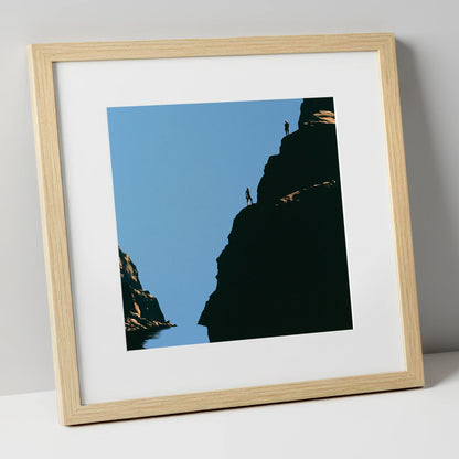 Silhouetted Climbers on Lakeland Crag lake district walking art print in natural frame