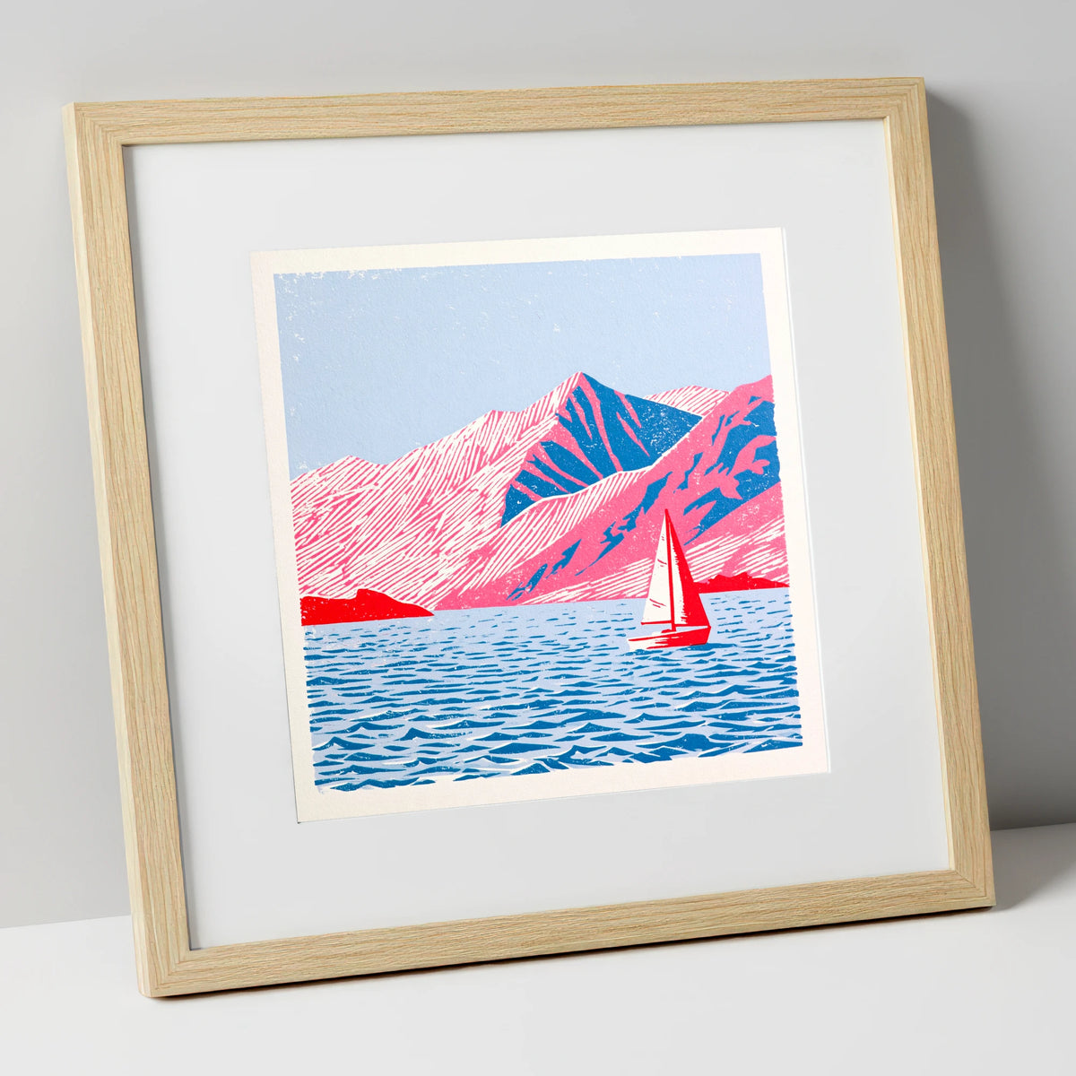 Red Sailboat on Vibrant Ullswater lake district lake art print in natural frame
