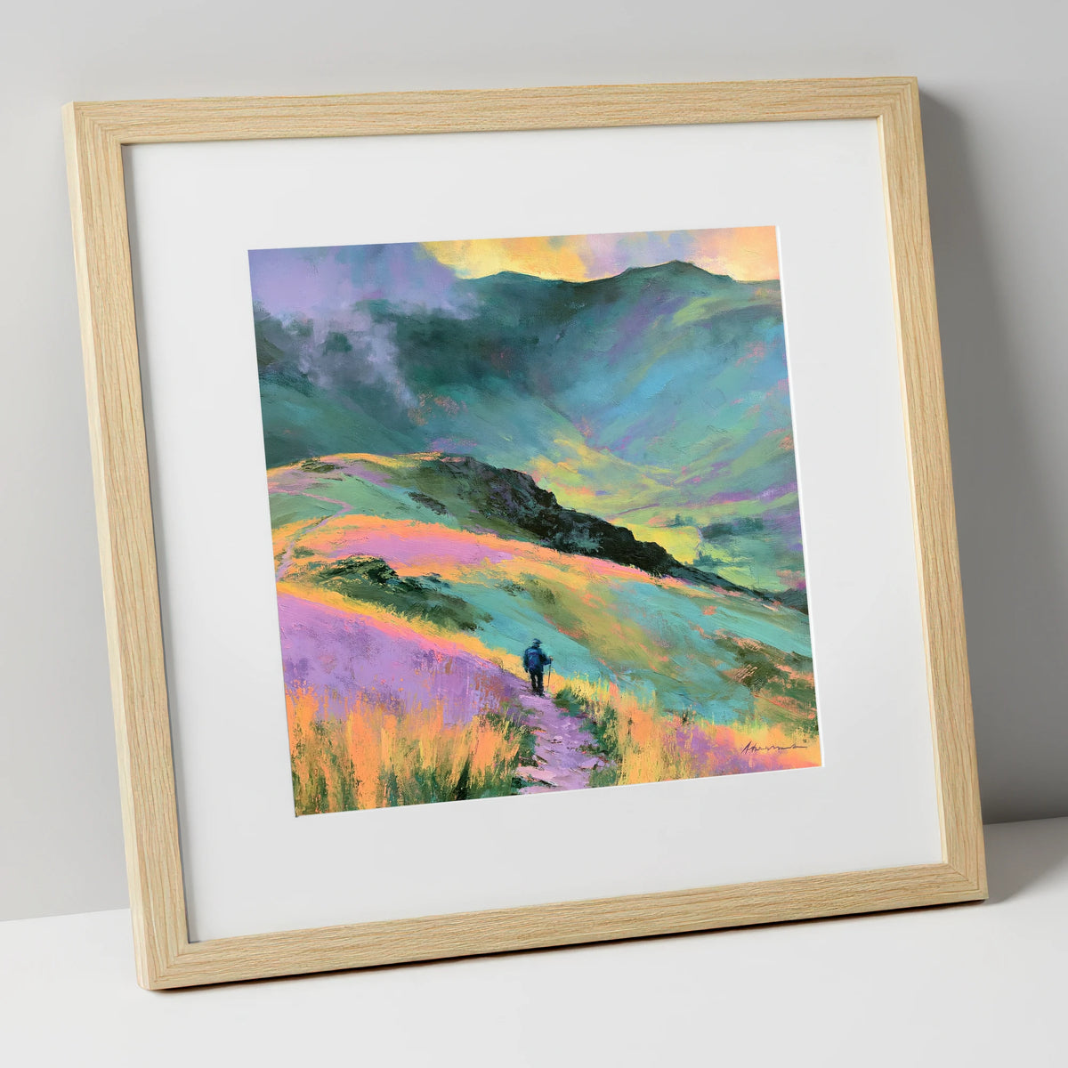 Lone Hiker on Pastel Fells lake district walking art print in natural frame
