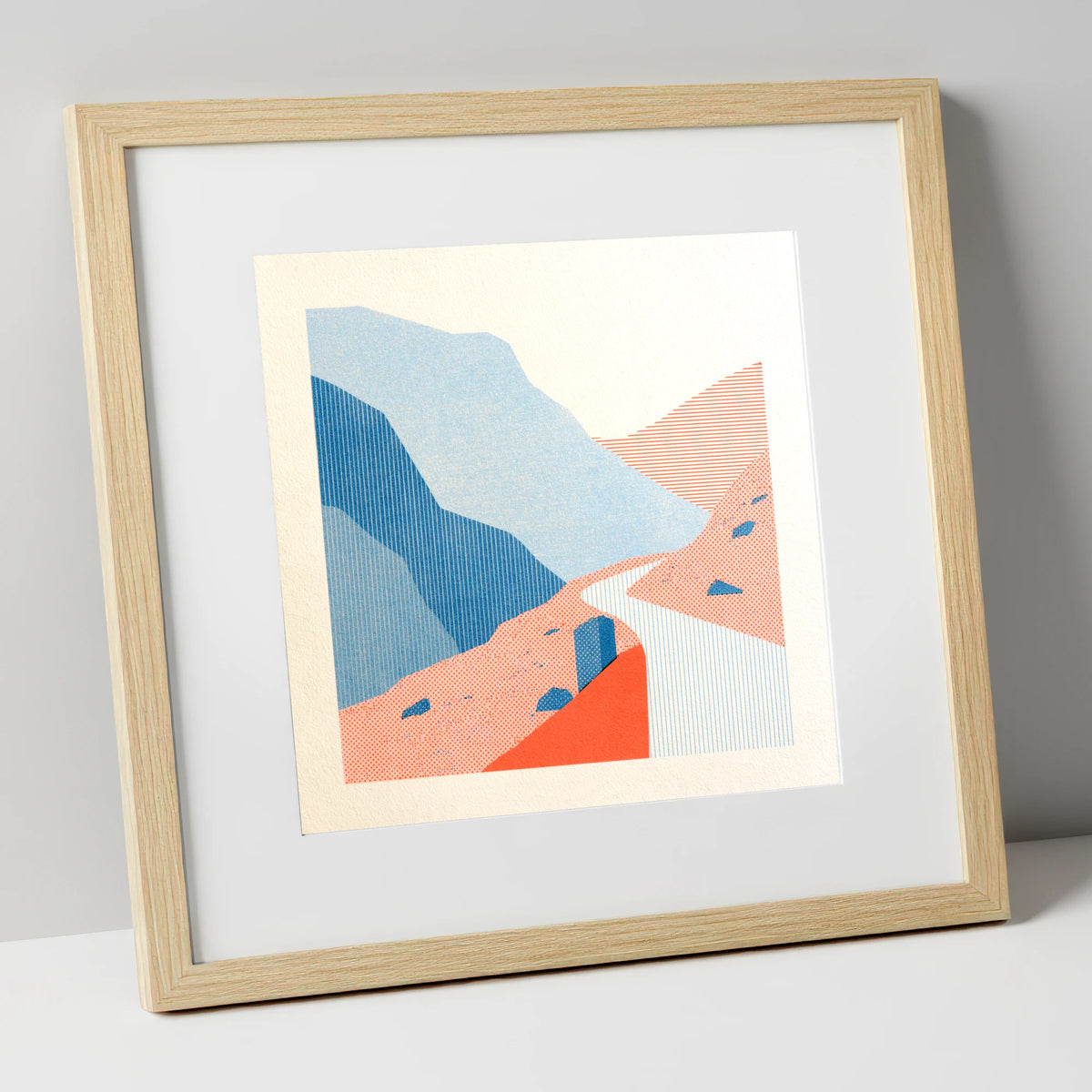 Hardknott Pass in Coral and Blue lake district valley art print in natural frame