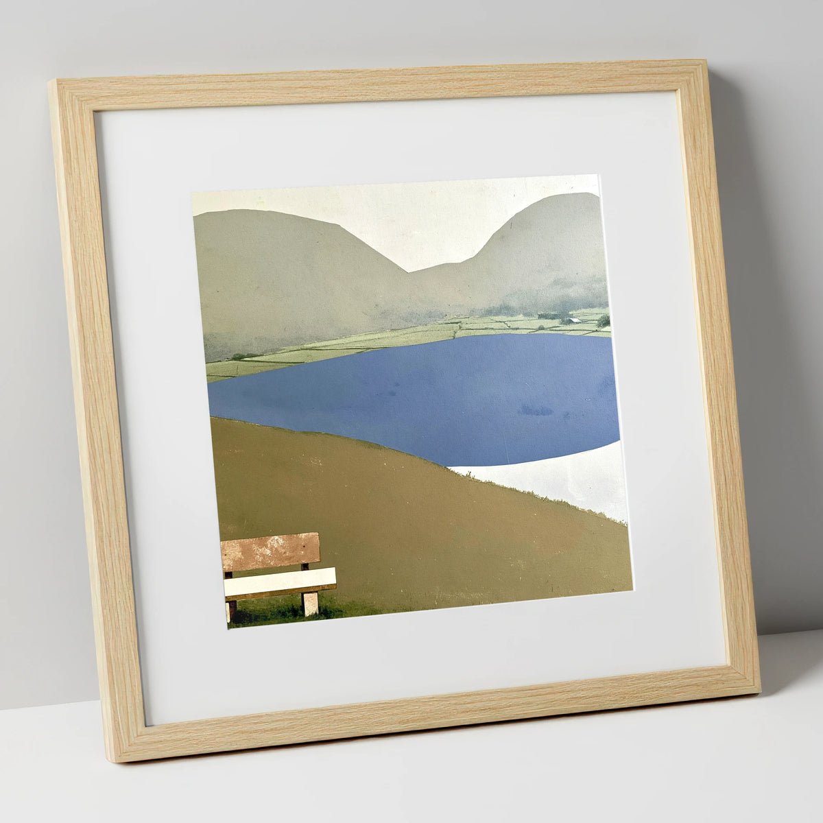 Bench Above Slate Blue Loweswater lake district lake art print in natural frame
