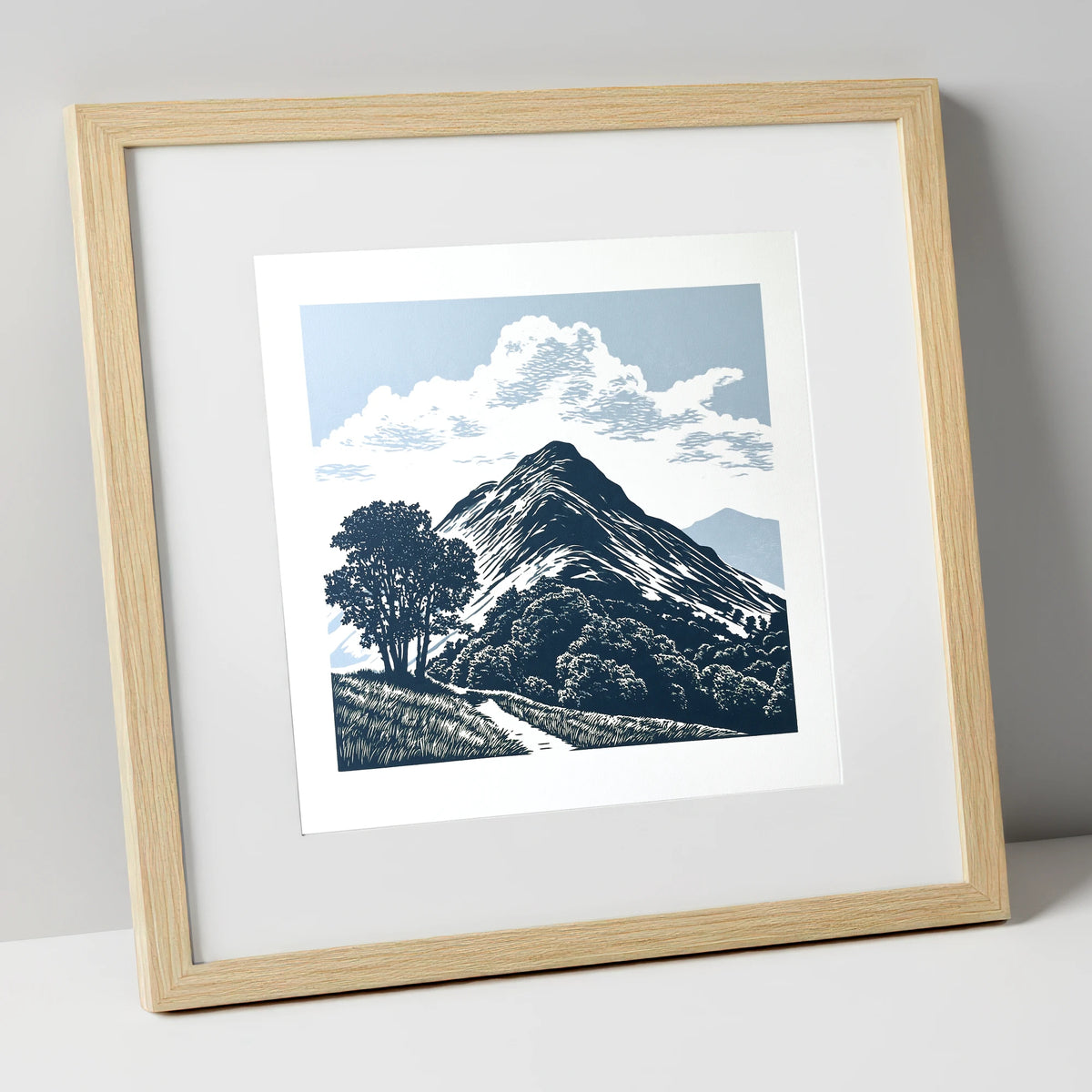 Catbells Fell in Deep Navy lake district fell art print in natural frame