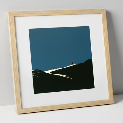 Hikers on a Sunlit Ridge lake district fell art print in natural frame