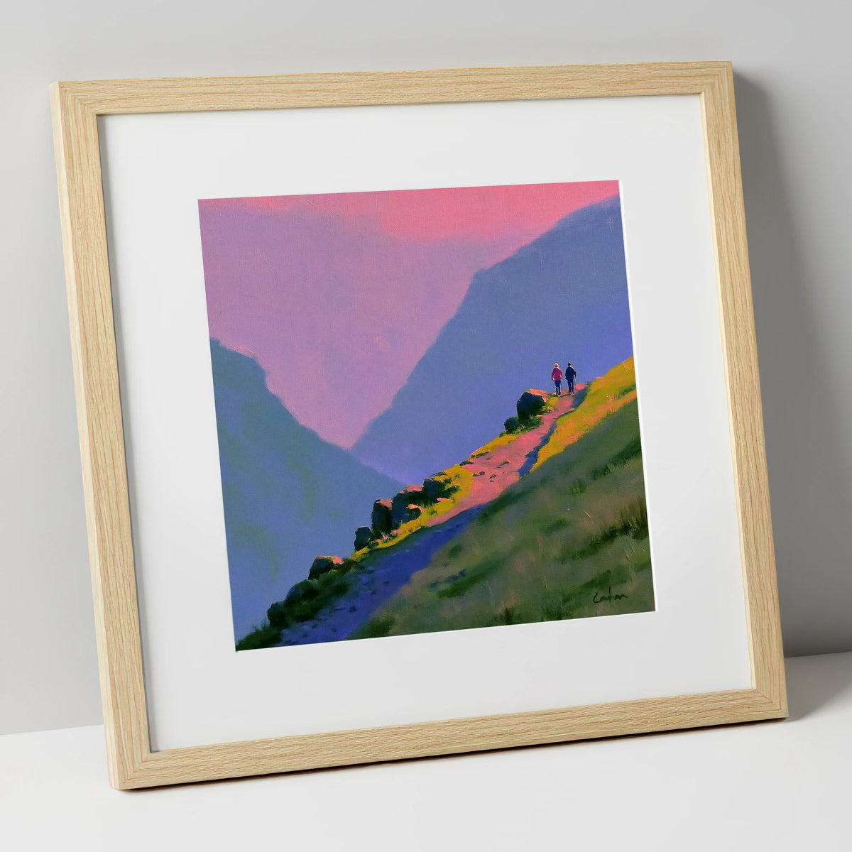 Walkers on a Vivid Mountain Path lake district walking art print in natural frame