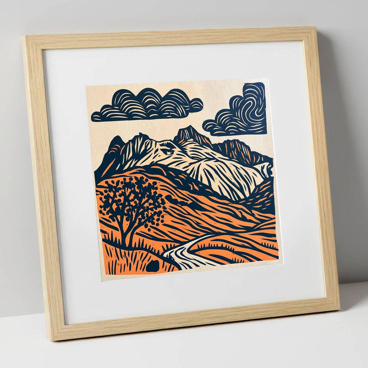 Langdale Pikes in Navy and Orange lake district fell art print in natural frame