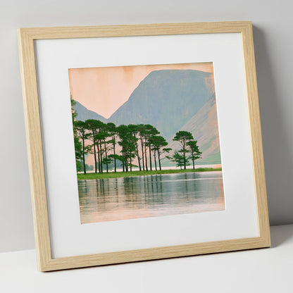 Buttermere Pines in Still Water lake district lake art print in natural frame