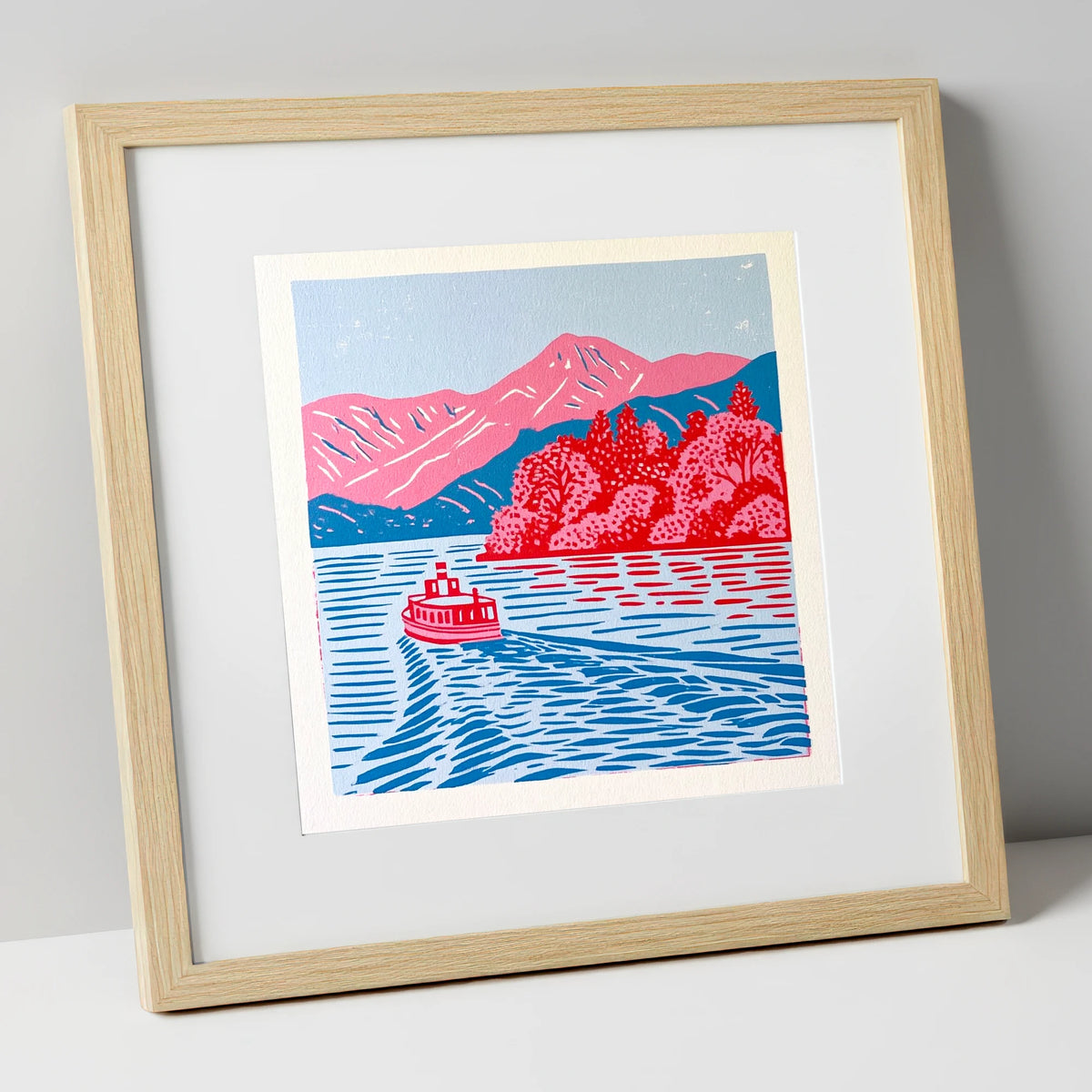 Vibrant Derwentwater Boat and Fells lake district lake art print in natural frame