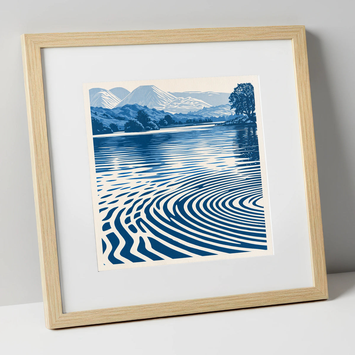 Calm Lake Ripples in Cobalt lake district lake art print in natural frame