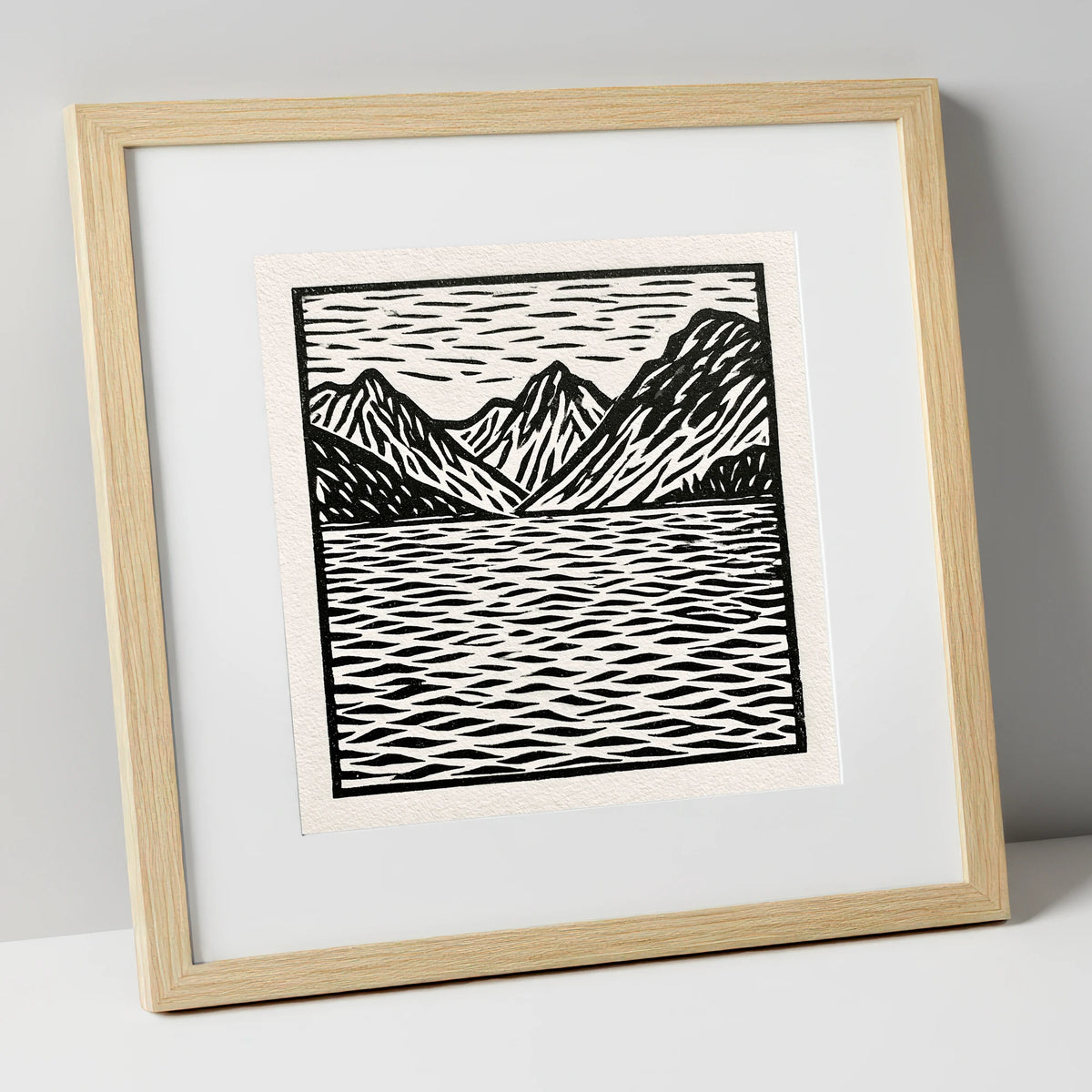 Monochrome Fells and Lake Reflections lake district lake art print in natural frame