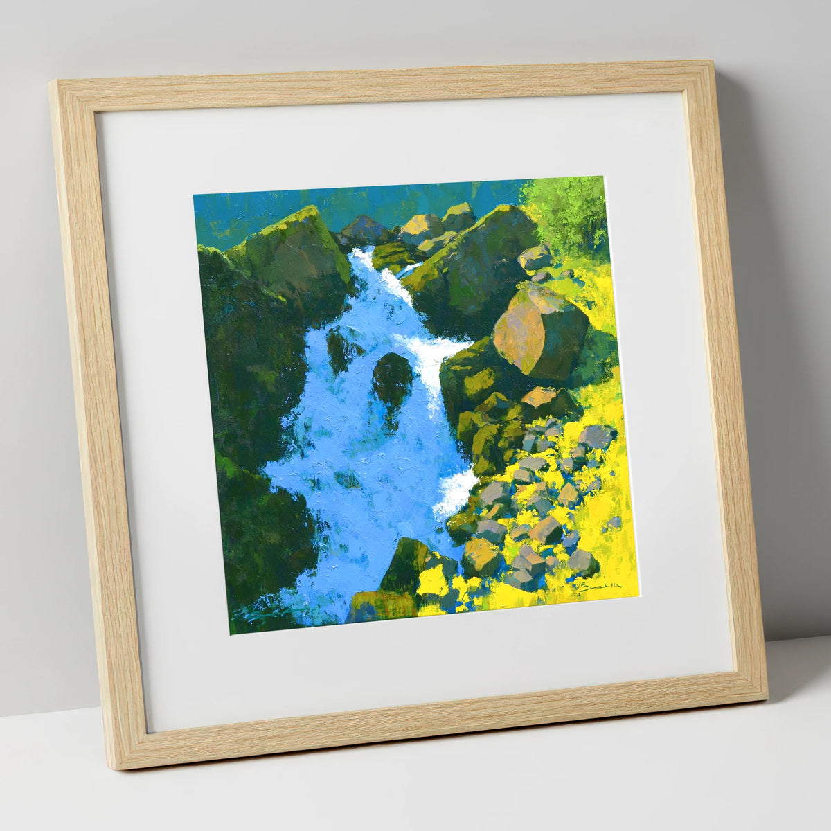 Vibrant Ghyll Waterfall and Sunlit Rocks lake district waterfall art print in natural frame