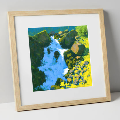 Vibrant Ghyll Waterfall and Sunlit Rocks lake district waterfall art print in natural frame