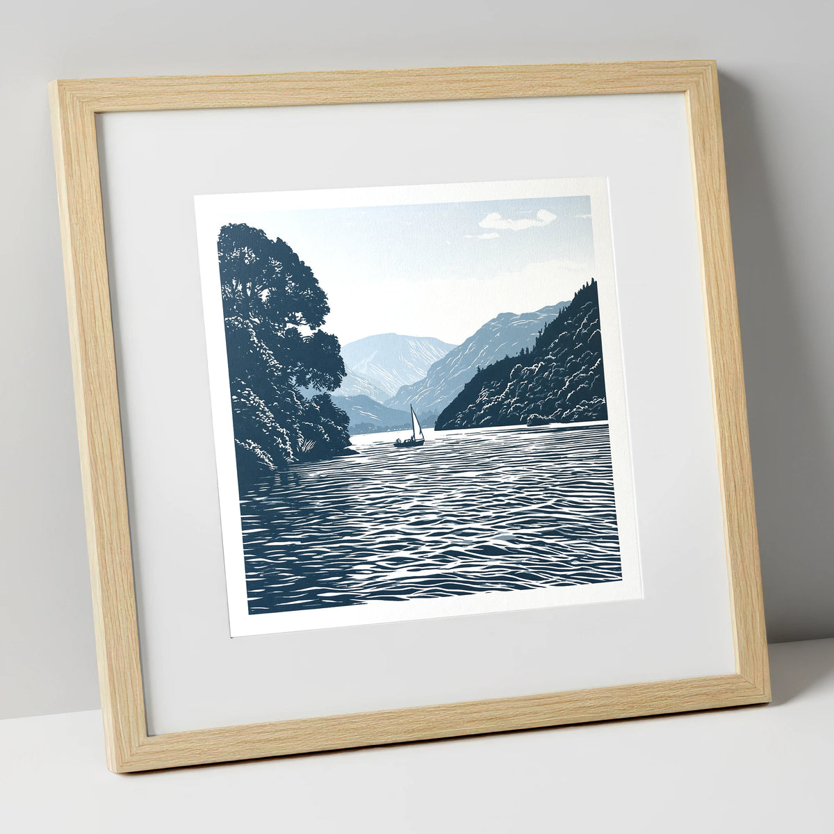 Ullswater Sailboat in Navy Blue lake district lake art print in natural frame
