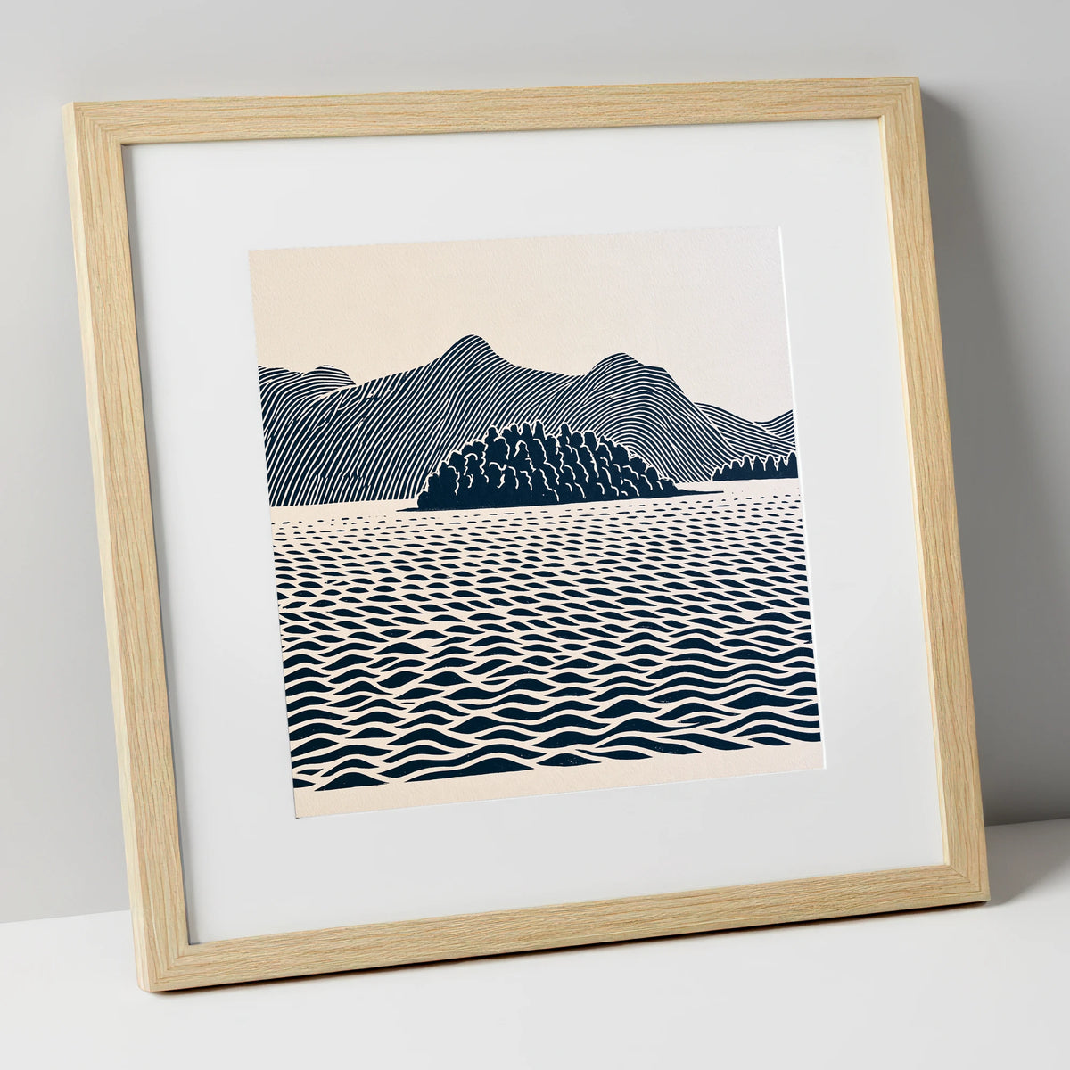 Derwentwater Island in Inky Blue lake district lake art print in natural frame