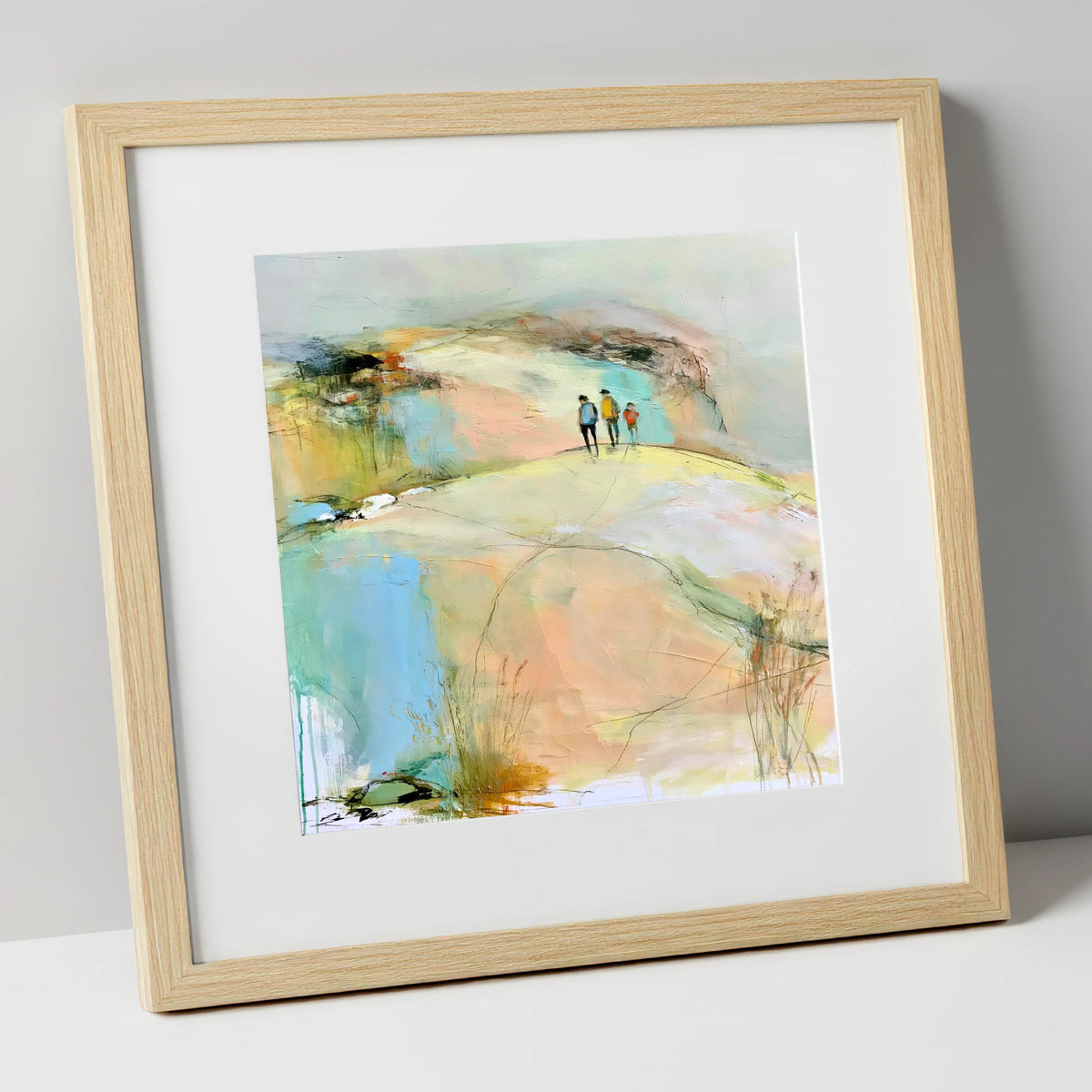 Hikers on the Pastel Fell lake district fell art print in natural frame