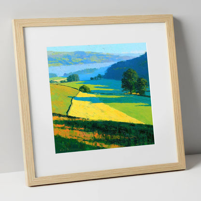 Sunlight and Shadow over Valley Fields lake district sky art print in natural frame