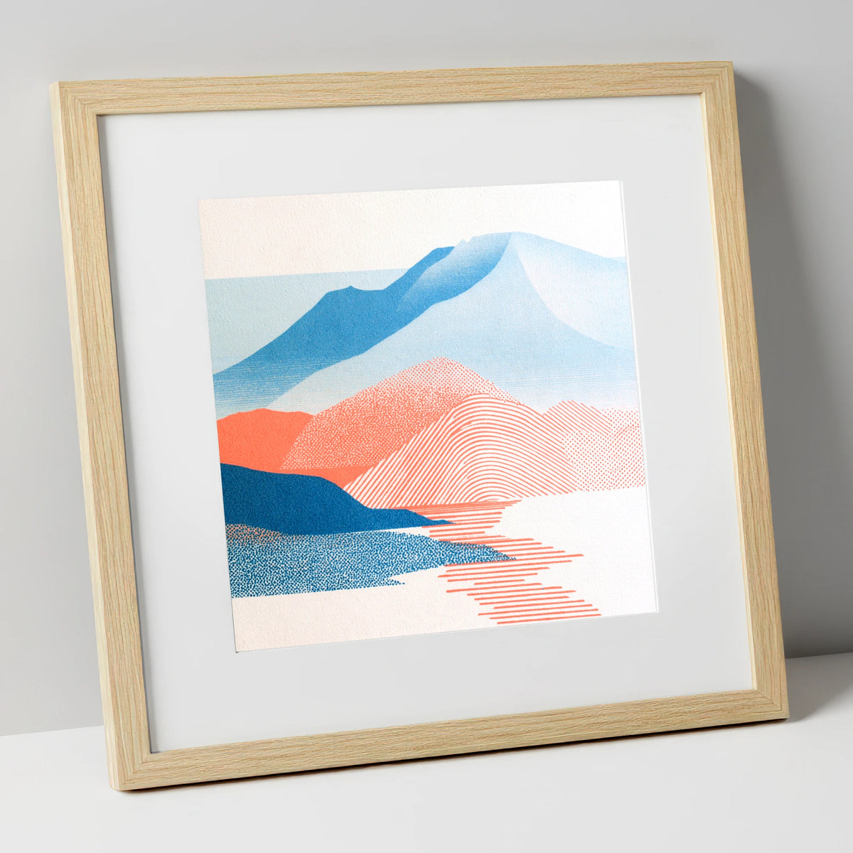 Graphic Skiddaw in Coral and Blue lake district fell art print in natural frame