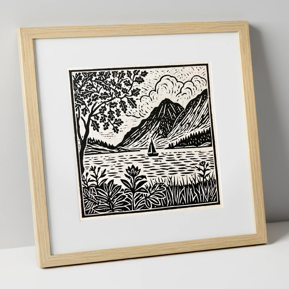 Monochrome Ennerdale Fells and Sailboat lake district valley art print in natural frame