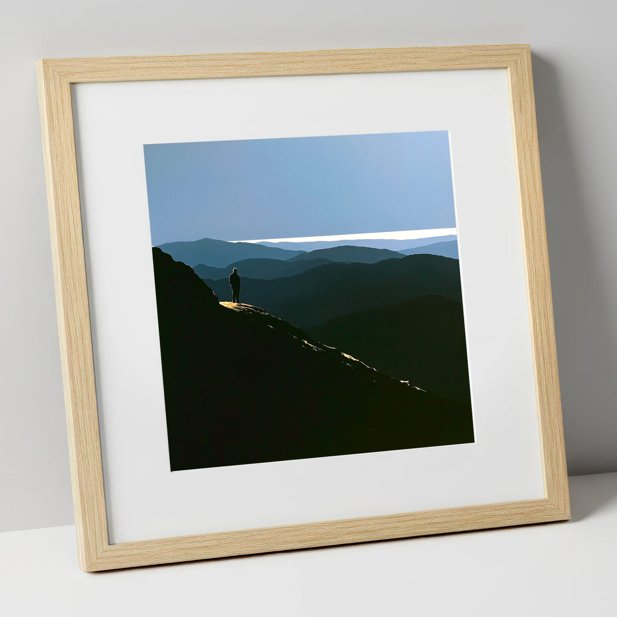 Summit View Across Blue Fells lake district fell art print in natural frame