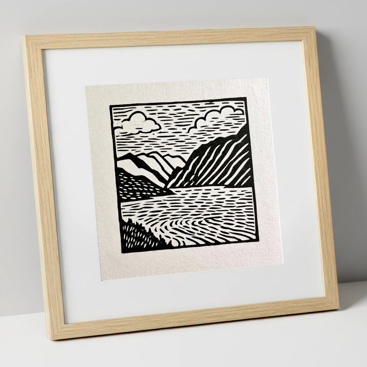 Graphic Monochrome Lake and Fells lake district lake art print in natural frame