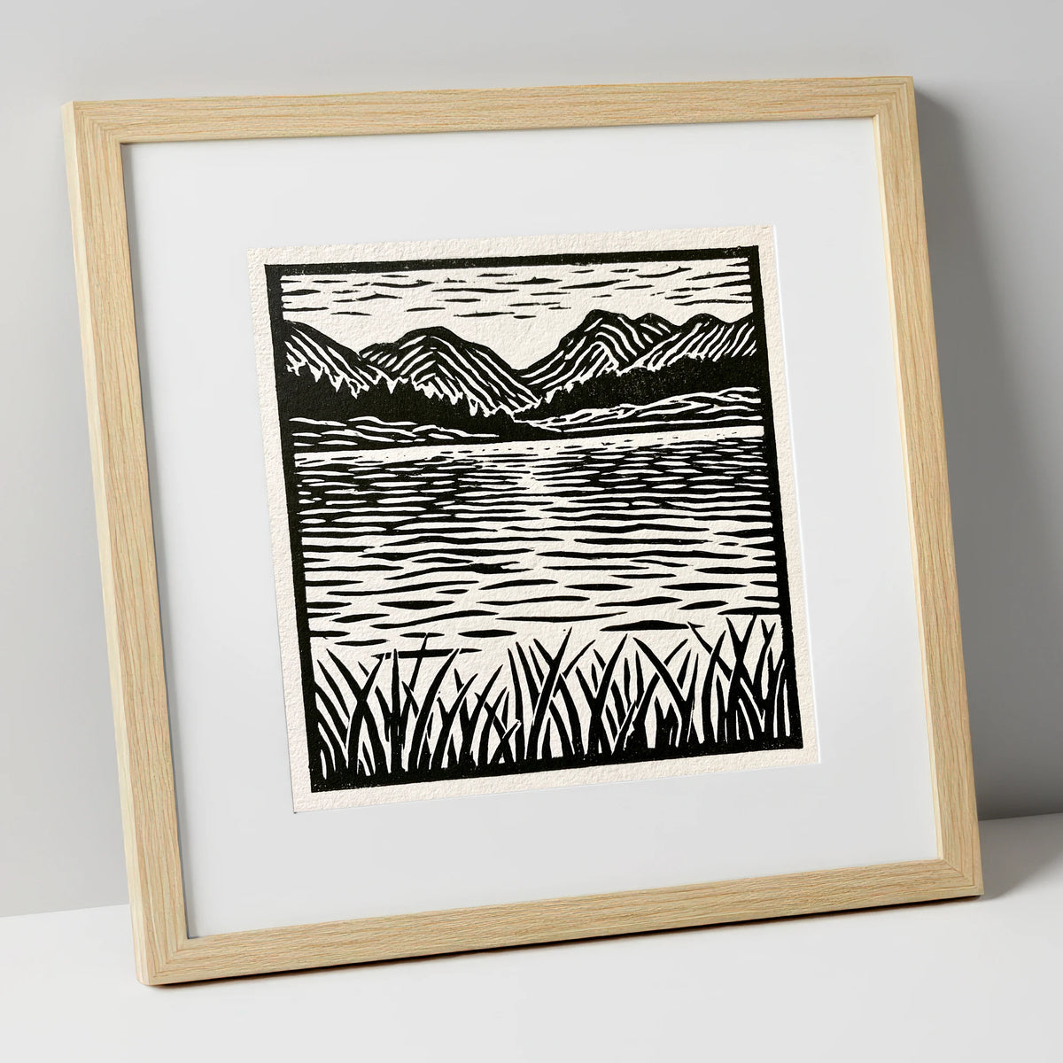 Calm Lake Reflections in Monochrome lake district lake art print in natural frame