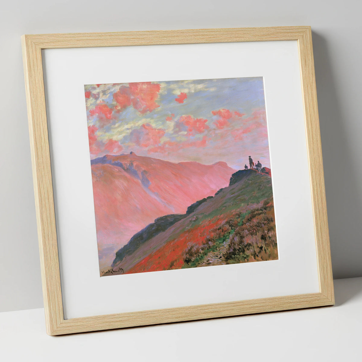 Hikers on a Pink Sunset Fell lake district fell art print in natural frame