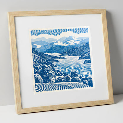 Coniston Water in Cobalt Blue lake district lake art print in natural frame