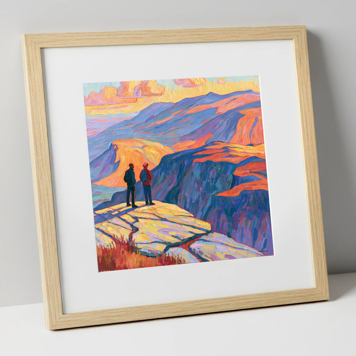 Hikers at Sunset on the Fells lake district fell art print in natural frame