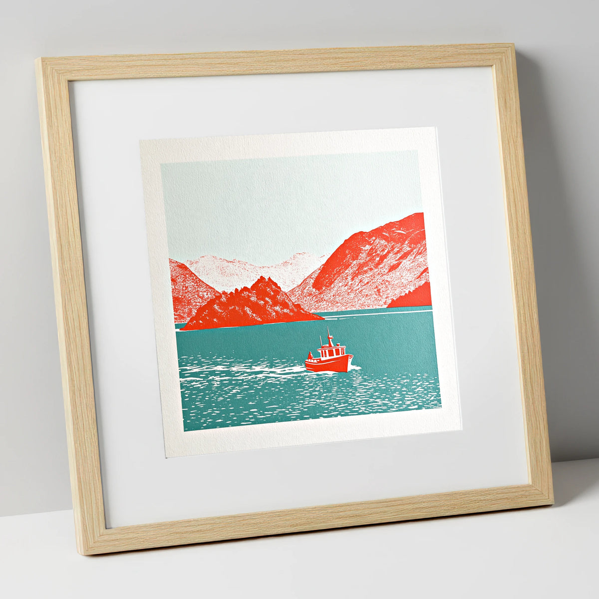 Red Boat on Teal Derwentwater lake district lake art print in natural frame
