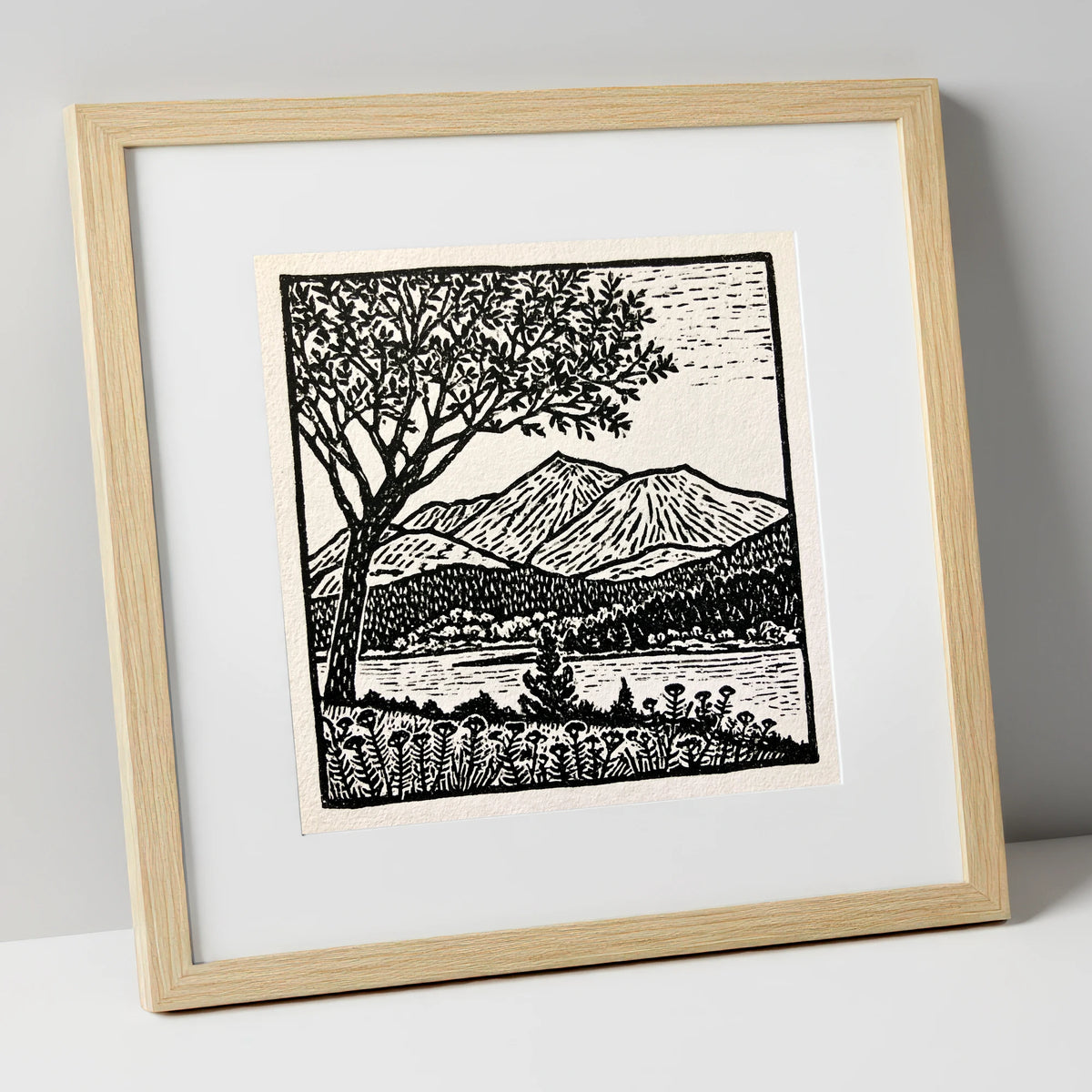 Monochrome Skiddaw and Lake lake district fell art print in natural frame