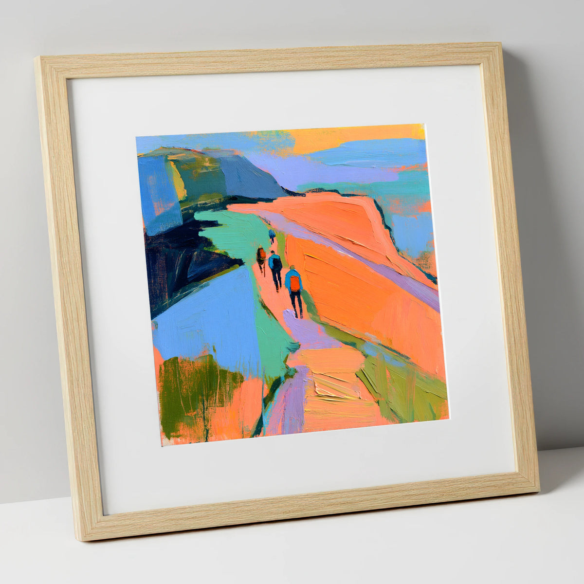 Walkers on Bright Mountain Path lake district walking art print in natural frame