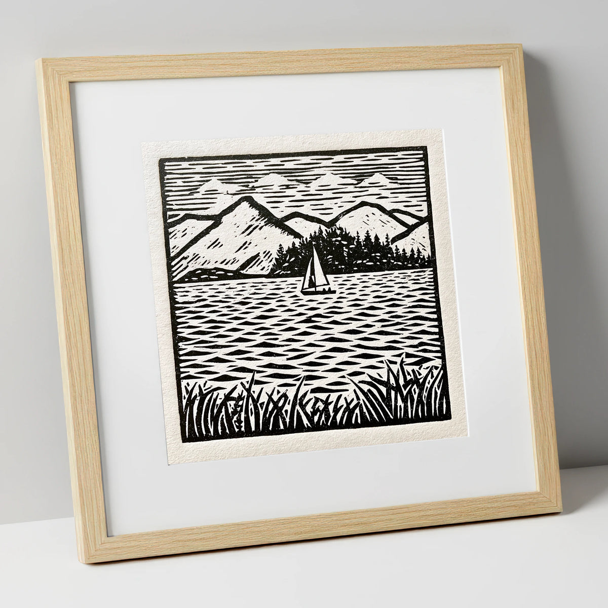 Monochrome Sailboat on Derwentwater lake district lake art print in natural frame