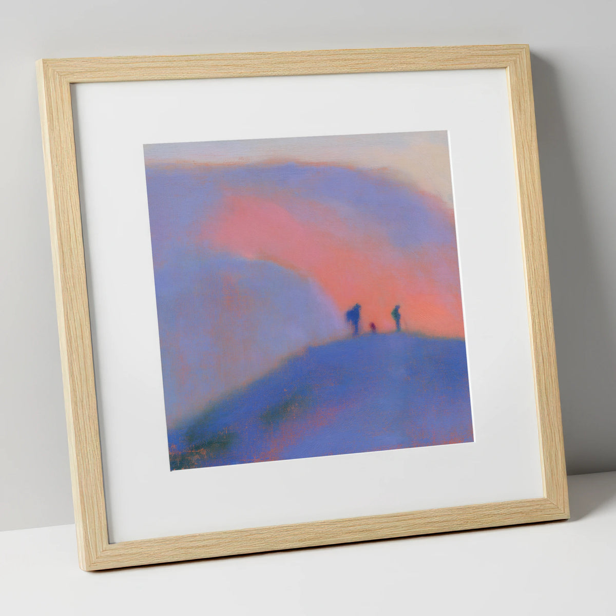 Hikers on a Twilight Fell lake district fell art print in natural frame