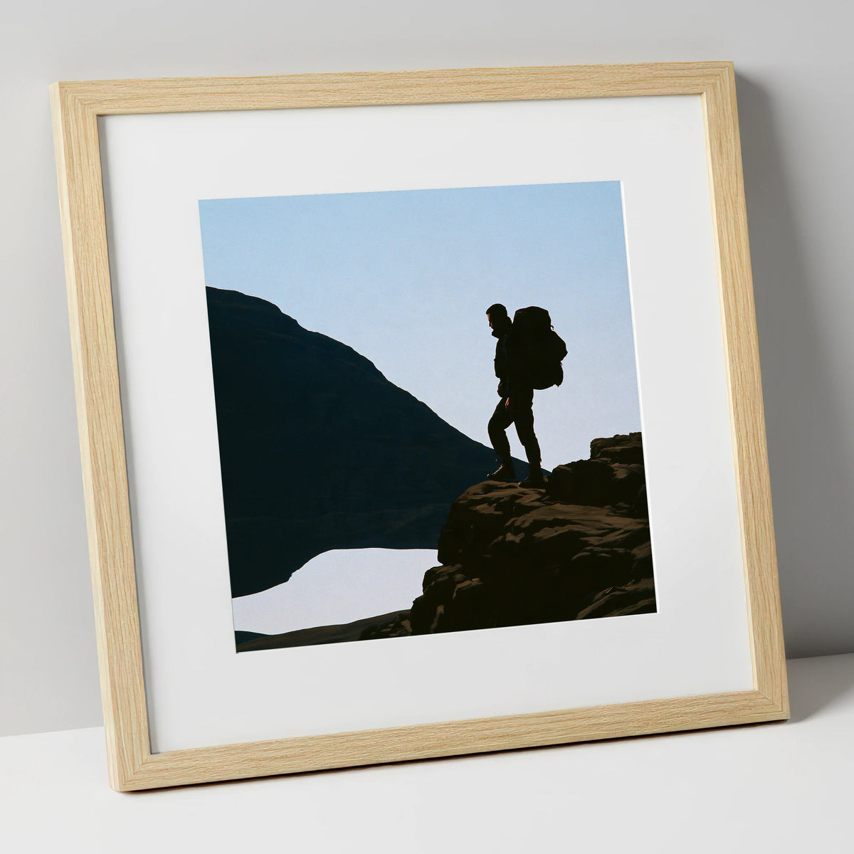 Helvellyn Walker in Silhouette lake district fell art print in natural frame