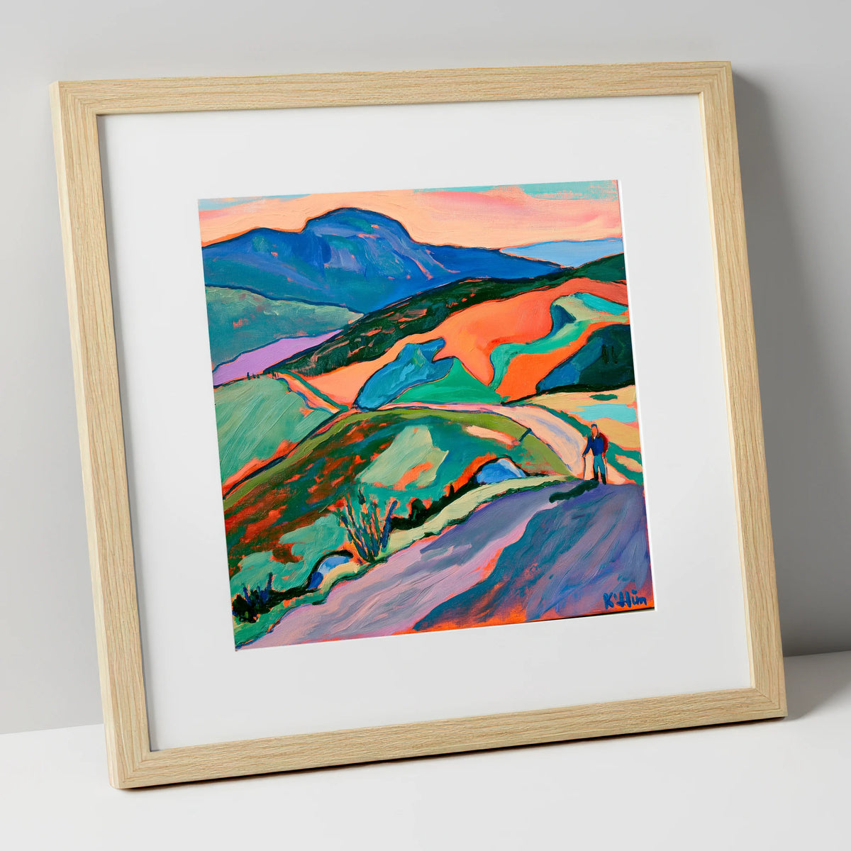 Lone Hiker on Colourful Fells lake district walking art print in natural frame
