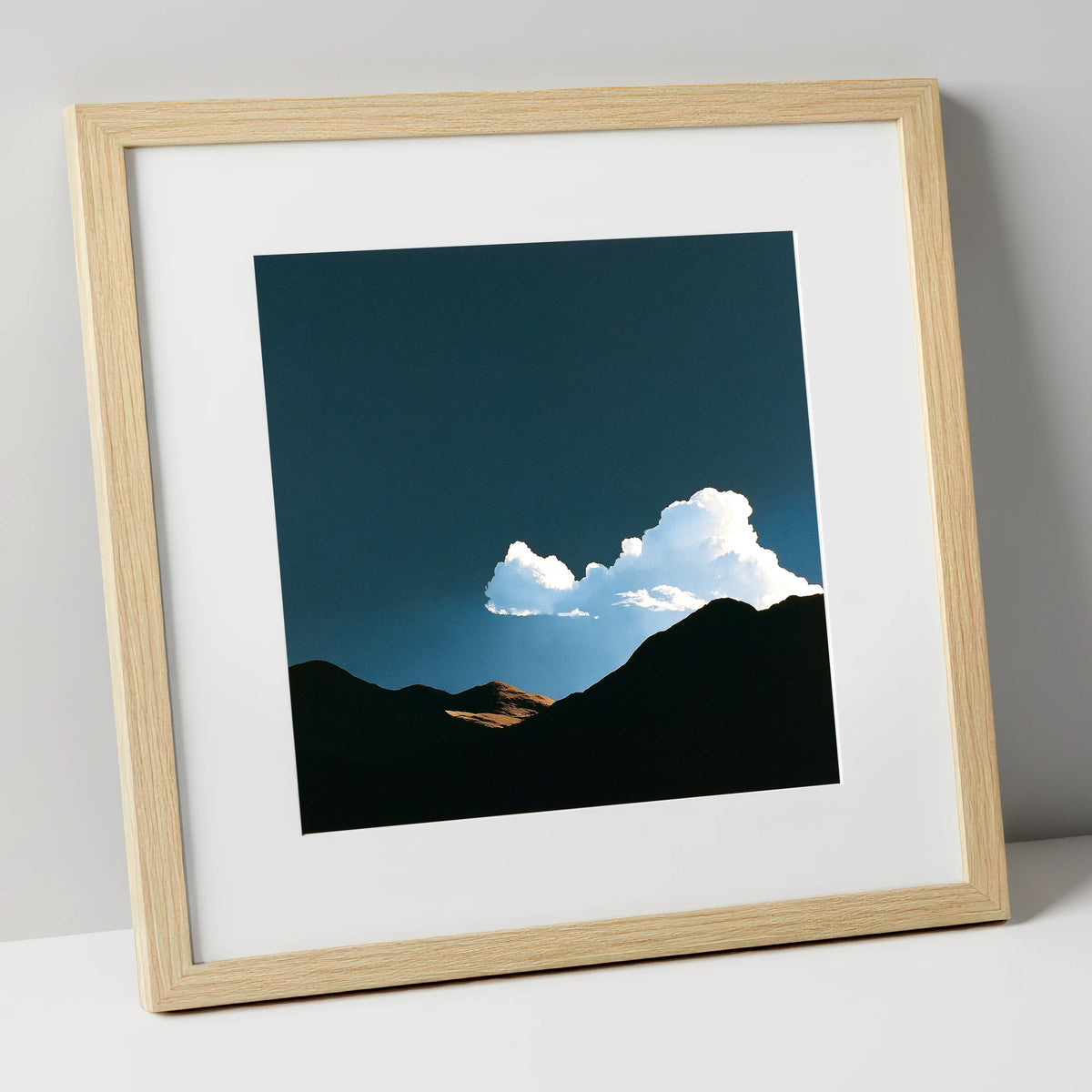 Storm Cloud Over Silhouetted Fells lake district sky art print in natural frame