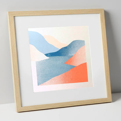 Graphic Coral and Blue Fells lake district lake art print in natural frame