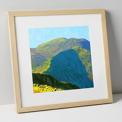 Sunlit Crags of Wetherlam Ridge lake district fell art print in natural frame