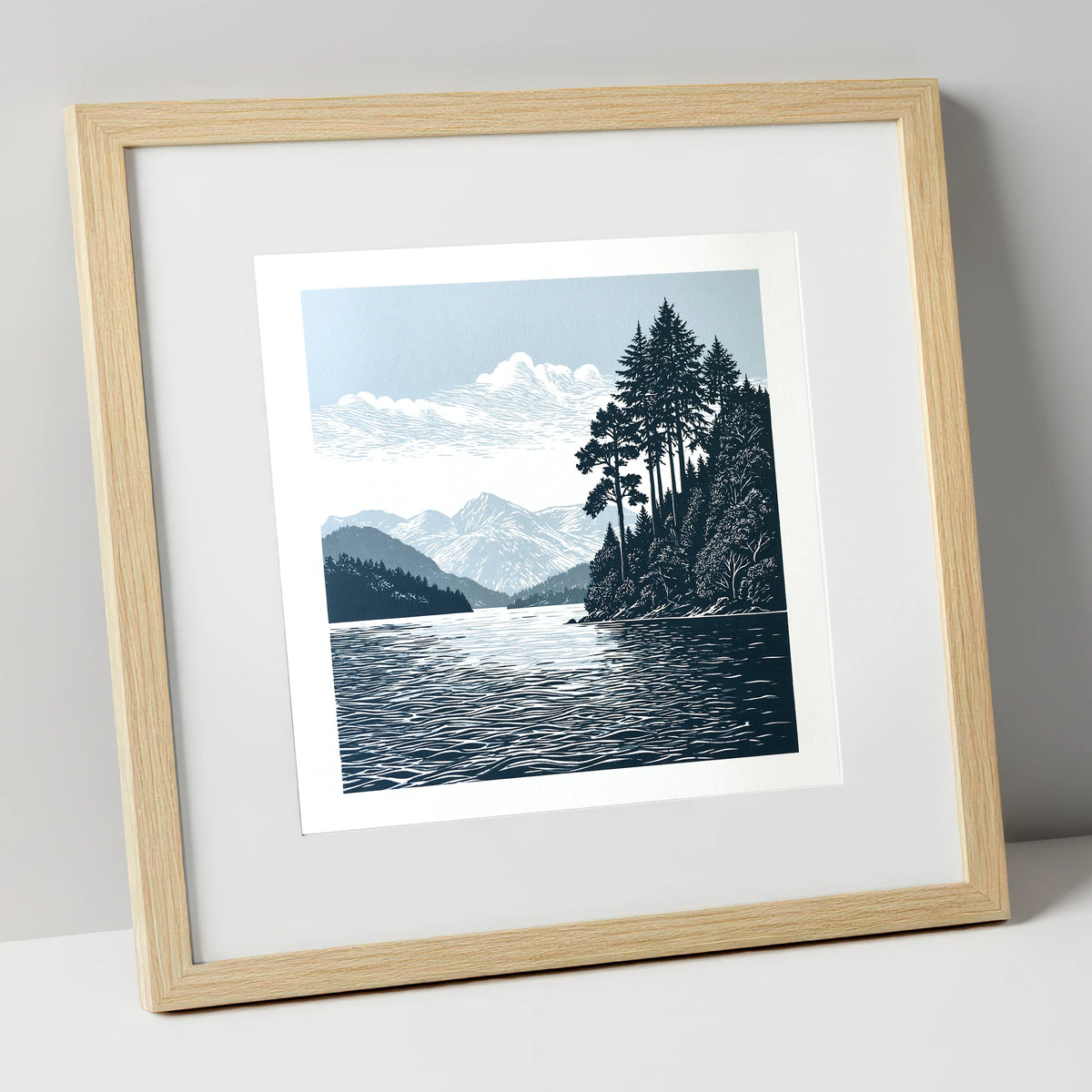 Windermere Shoreline in Deep Navy lake district lake art print in natural frame