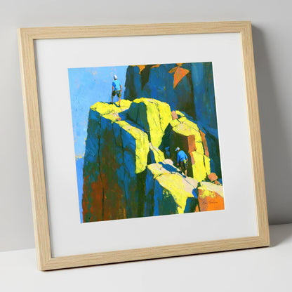 Mountaineers on a Sunlit Crag Pinnacle lake district walking art print in natural frame