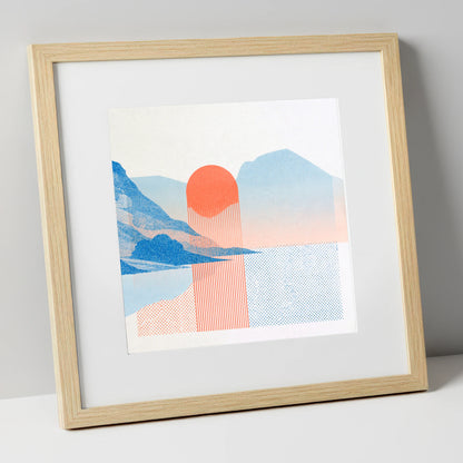 Modern Buttermere in Coral and Blue lake district lake art print in natural frame