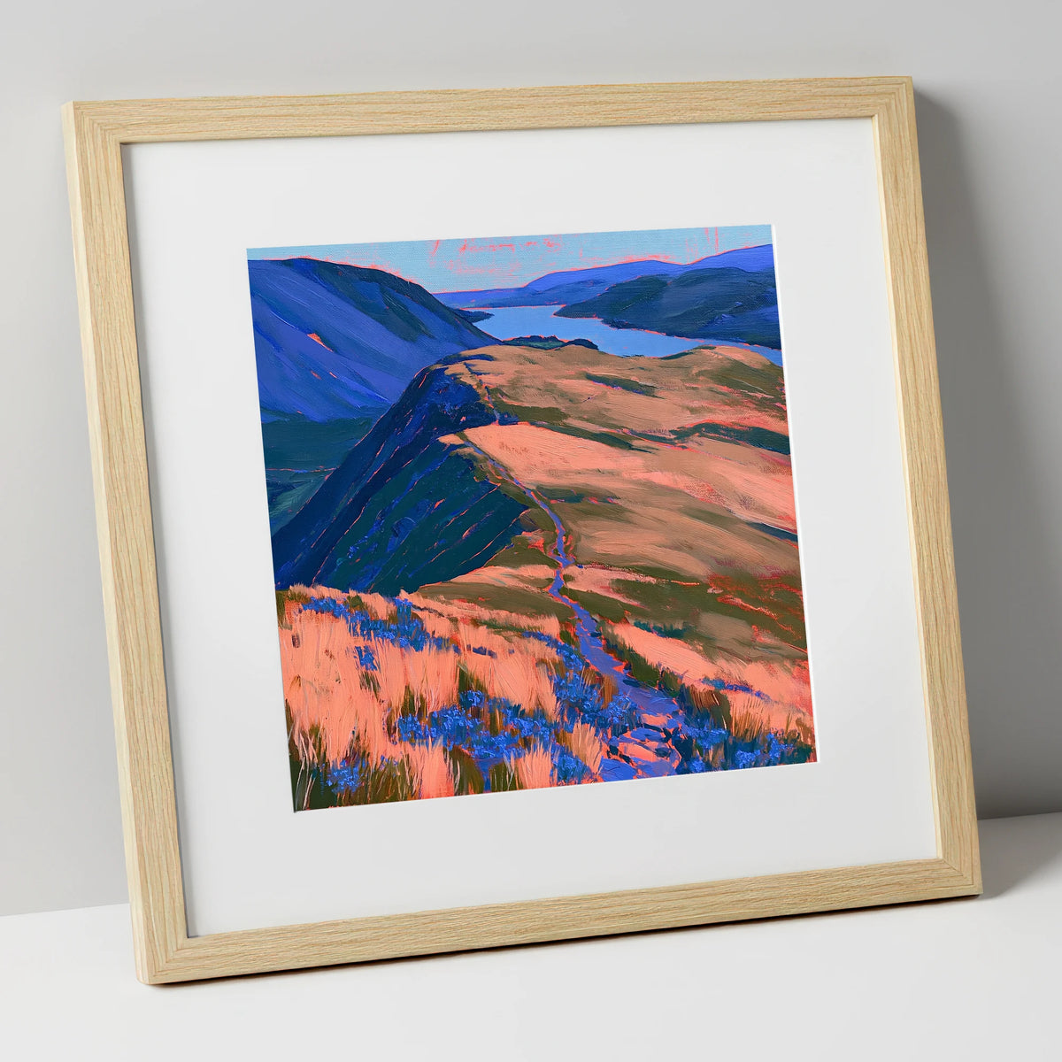 Beda Fell Ridge in Coral Light lake district village art print in natural frame