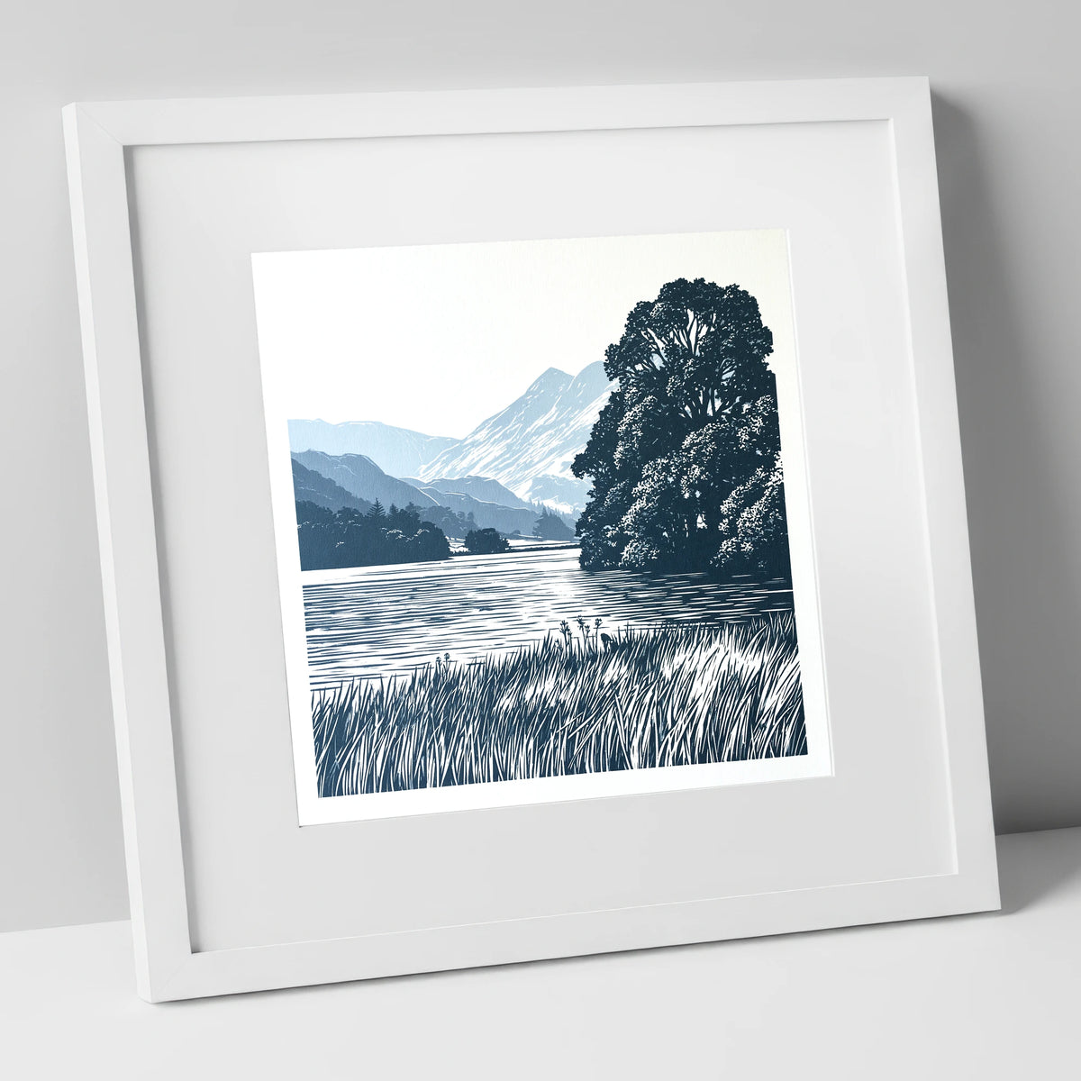 Grasmere Lake in Navy Blue lake district lake art print in white frame