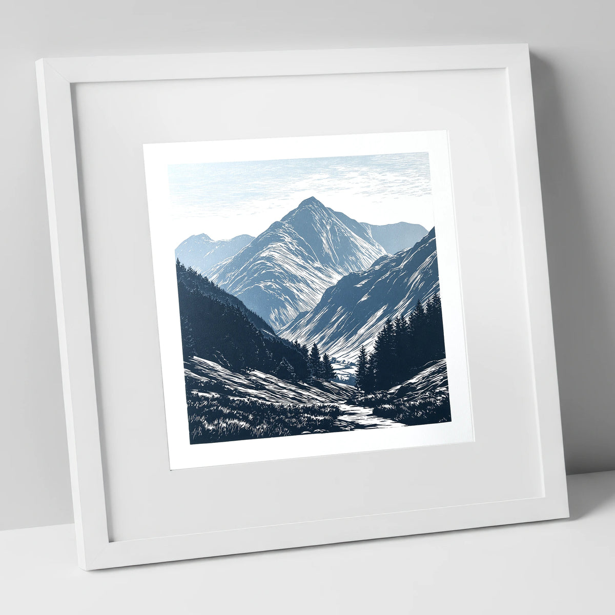 Bowfell Peak in Slate Blue lake district fell art print in white frame