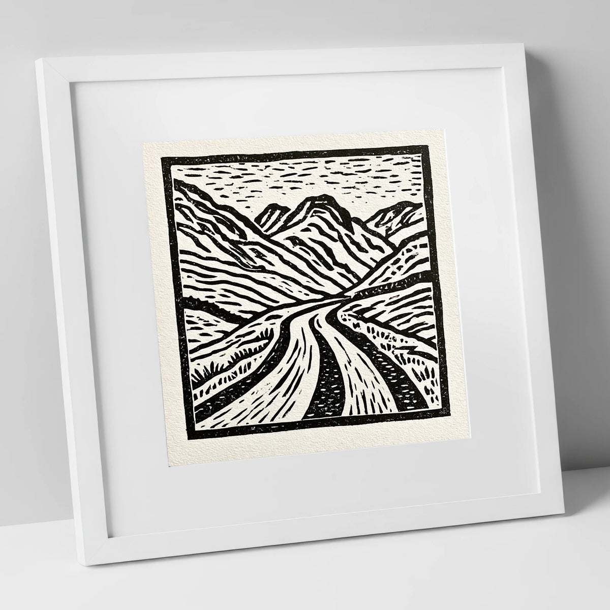 Hardknott Pass in Stark Monochrome lake district valley art print in white frame