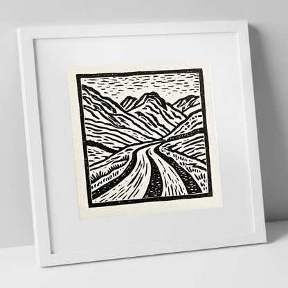 Hardknott Pass in Stark Monochrome lake district valley art print in white frame