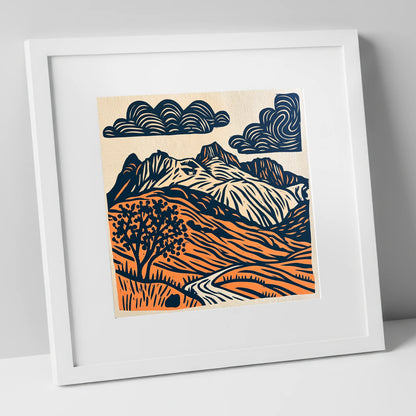 Langdale Pikes in Navy and Orange lake district fell art print in white frame