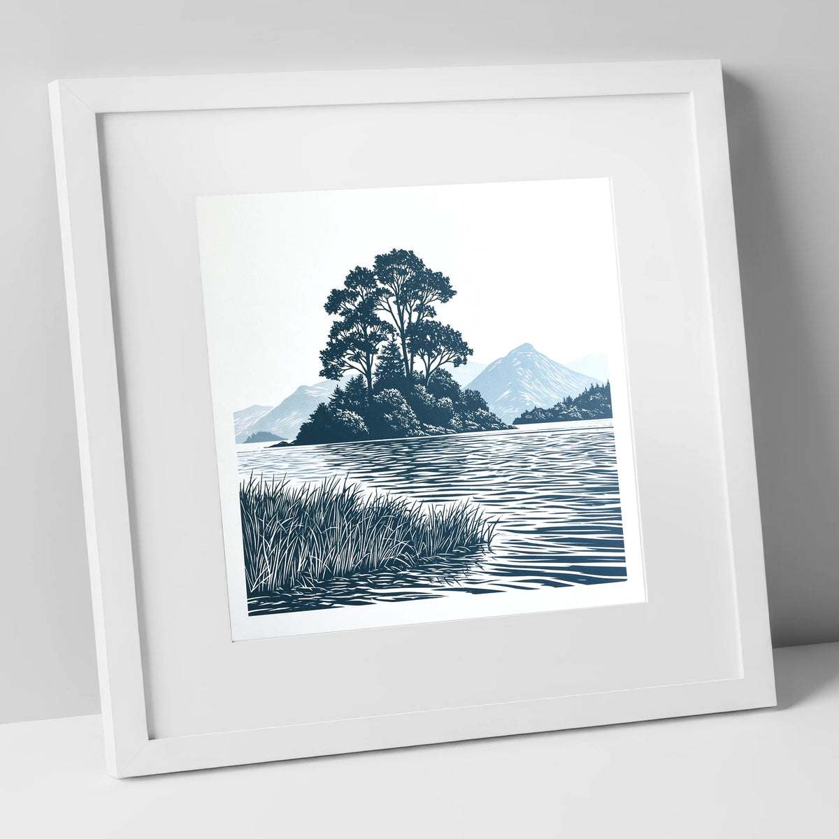 Derwentwater Island in Slate Blue lake district lake art print in white frame