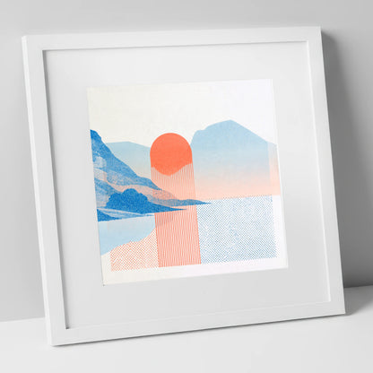 Modern Buttermere in Coral and Blue lake district lake art print in white frame