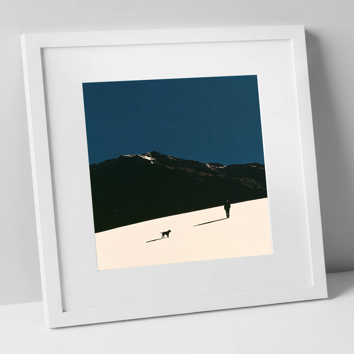 Silhouetted Dog Walker on Skiddaw gifts for dog walkers art print in white frame