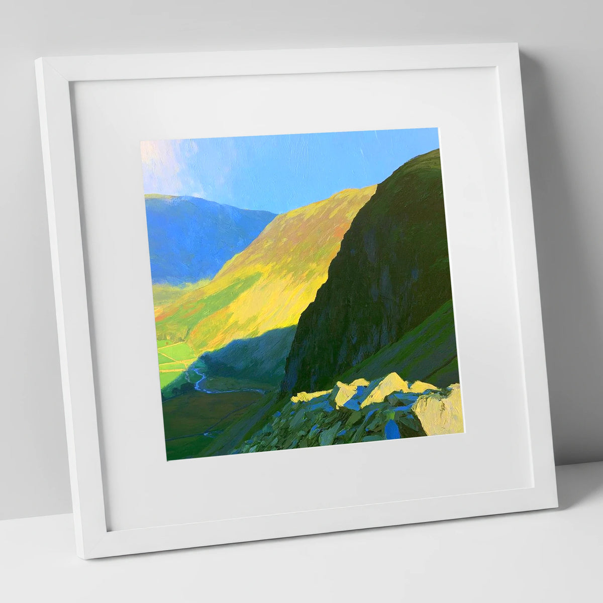 Sunlit Tarn Crag and Valley lake district fell art print in white frame